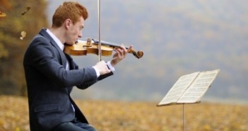 Describe the impact of an artist or musician who managed to capture the public imagination and achieve fame in their lifetime. Critically review the content of their work, and explain why it remains compelling today